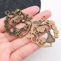 Vintage bronze Alice in Wonderland charms featuring Sweet and Dream signs and figures - Round Alice Garden Forest Pendant (M1667)