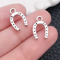 Antique silver horseshoe charm pendant with black dot pattern for DIY jewelry making - Dotted Horseshoe