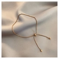 Detalle de pulsera de cadena de serpiente en oro rosa con cierre deslizante ajustable - Rosa oro