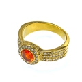 Detail of 18k gold plated titanium ring with orange zircon center and pave setting - Gold with Orange Red Zirconia