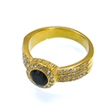 Macro shot of a luxury 18k gold-plated ring with black zircon center and pavé halo diamonds - US 6 / Gold Black Zirconia