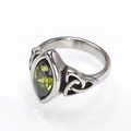 Detailed macro view of Marquise-cut olive green gemstone on Celtic knot silver ring - 7 / Steel Color Olive Green Zircon