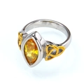 Detail of marquise cut yellow gemstone and golden Celtic knot on a titanium ring - 7 / Two-tone Gold Silver Yellow Zircon