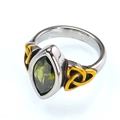 Macro detail of retro steel ring featuring olive green gem and golden Celtic knots - 7 / Two-tone Olive Green Zircon