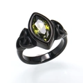 Close-up of black titanium ring featuring marquise-cut olive green gemstone detail - 7 / Black with Olive Green Stone