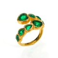 Golden heart ring with emerald green zircon stones in a wave pattern on white background - US 6 / Gold Green Zirconia