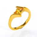 Detailed macro view of a 18K gold ring featuring a sparkling square yellow zircon stone - US 6 / Gold Yellow