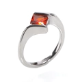 Detailed macro view of silver ring with orange rectangular gemstone and polished finish - US 6 / Silver / Orange