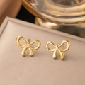 Elegant gold bow-shaped titanium steel stud earrings on a textured jewelry tray - 【g3035】bow Earrings Gold