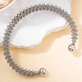 Silberner Edelstahl-Armreif im Feder-Design mit polierten Perlenenden für Damen - Großer Rhythmus #3 / Silber