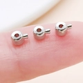 Micro silver plated copper slide beads with center hole and stopper on a fingertip - Flat / 4.5x3mm Hole 1mm / White Gold
