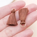 Pair of mini brown tassels with golden metal rings for DIY jewelry and backpack charms - Coffee
