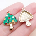 Green mushroom enamel charm with colorful polka dots and golden metal backing - Enamel Colorful Polka Dot Green Mushroom (18990)