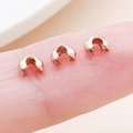 Rose gold moon bead tips jewelry crimp covers shown for size reference on finger - 3x4x2.4mm / Small Rose Gold Tray