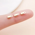 Small gold cord end crimp clips for jewelry making shown on fingertips for scale - Small / KC Gold Polished Style