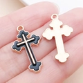 Ciondolo a croce dorato con smalto nero e bordi ondulati per creazione di gioielli fai da te - Ciondolo a Croce in Smalto Nero (9950) / 14x25mm