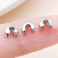 Silver-plated copper C-shaped crimp bead covers for jewelry making on a fingertip - White K - Medium