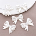 Eleganti perline a fiocco in finta perla ABS per gioielli e accessori fai da te fatti a mano - Grande Fiocco Diretto a Doppia Faccia (25811) / 1 Pezzo (29x23mm) / Bianco Sporco