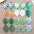 Assorted colorful glass leaf charms with gold sand and glitter for DIY jewelry making - 12 Styles Mixed (20 Pieces)