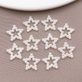 Set of 10 star shaped faux pearl charms for DIY nail art and phone case decoration - Hollow Star (12x12mm)