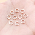 Set of ten silver geometric circular metal rings for DIY earring and jewelry making - 6mm / Bright Silver