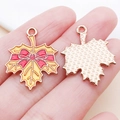 Maple leaf DIY charms with yellow enamel and red bow detail for jewelry making - 25x20MM / Yellow Bow Maple Leaf (25230)