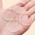 Set of four polished silver round metal rings for DIY earring and jewelry making - 30mm / Bright Silver