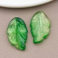 Frosted emerald green leaf pendant with gold glitter for DIY jewelry making - Transparent Green Gold Dusted Glass Leaf (26668) / 27x16.5mm