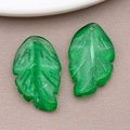 Two translucent green leaf pendants for DIY jewelry with detailed vein textures - Transparent Green Glass Leaf (26669) / 27x16.5mm