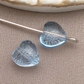 Light blue 6mm heart glass spacer bead with grid texture and metal pin for jewelry DIY - Medium Transparent Blue Heart Bead (26830)