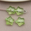 Cuentas de vidrio en forma de estrella verde hierba para creación de joyería - Estrella de Cinco Puntas (26715) / 8x8mm (1 Pieza) / Verde Transparente