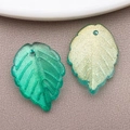 Leaf shaped glass beads in green and gold gradient with fine glitter for DIY jewelry - Transparent Mint Green Gold Foil (BE47-26903)