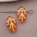 Perla foglia in vetro ambrato con venature dorate e spillo metallico per gioielli - Arancio Giallo Trasparente con Bordo Dorato