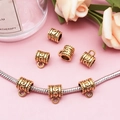 Detail of antique gold large hole beads with swirl patterns for DIY jewelry charm bracelets - Vintage Swirl Style (14333)