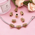 Macro shot of antique gold large hole bead with wave texture on snake chain - Arch Pattern Style (14339)