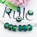 Detail of faceted gradient beads in green and blue with silver core for DIY jewelry - Faceted Bead (16295) / 1 Piece / Green To Blue Gradient