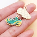 Golden soccer shoe charm with green enamel detailing for DIY jewelry crafting - Green Enamel Football Shoe (27158)