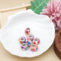 Makroaufnahme bunter Acrylperlen im Pandora-Stil mit Metalleinsatz in Muschelschale - Regenbogen Rosa Großloch-Stil (14438) / 1 Stück (9x13mm)