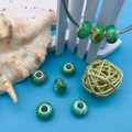Grüne DIY-Perlen mit Tintenmuster und Silberkern für die Schmuckherstellung - Grün