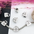 Silver handbag-shaped alloy bead with floral patterns for DIY snake chain bracelets - Handbag Style (8804)