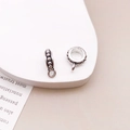 Antique silver finish jewelry bail connector with relief dots and a closed ring loop - Antique Silver Three-Way Bail 6x9 (13890)