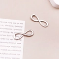 Silver infinity symbol charm pendants for DIY jewelry making in a minimalist metal finish - Infinity Symbol 8x23mm-2970