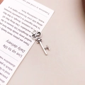 Antique silver alloy key pendant with hollow heart and floral relief details - Antique Silver Small Key (6722)
