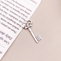 Vintage silver alloy key pendant with intricate filigree details for DIY jewelry - Hollow Scroll Pattern Key (7706)