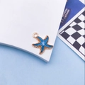 Pendentif étoile de mer en émail bleu avec bord doré pour création de bijoux DIY - Étoile de Mer Bleue / 15x18mm