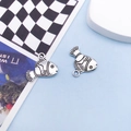 Antique silver fish charms in zinc alloy with detailed scales for DIY jewelry making - 14x16mm