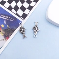 Pair of antique silver zinc alloy fish charms with detailed scales for DIY jewelry making - 9x20mm