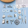 Antique silver graduation charms set featuring school bus and graduation cap pendants - Mixed Graduation Theme Set