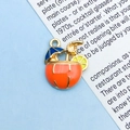 Tropical cocktail enamel charm with blue umbrella and orange fruit for jewelry making - Orange-Yellow Coconut Drink (14961)