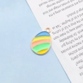 Colorful Easter egg pendant charm with striped enamel inlay and gold alloy frame - Multicolor Striped Egg